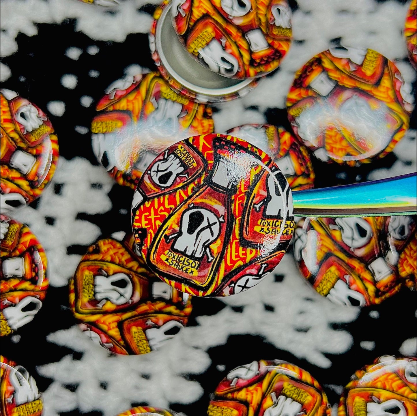 1.25" toxicity chop suey button bundle.