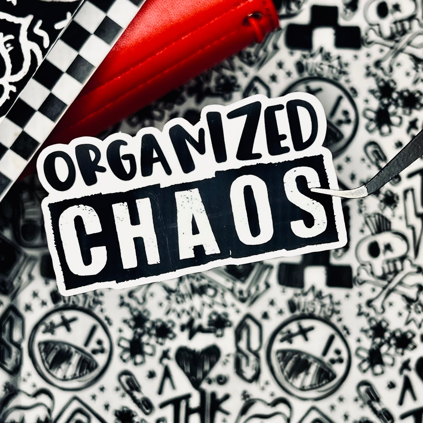 organized chaos. 3" soft vinyl die cut.